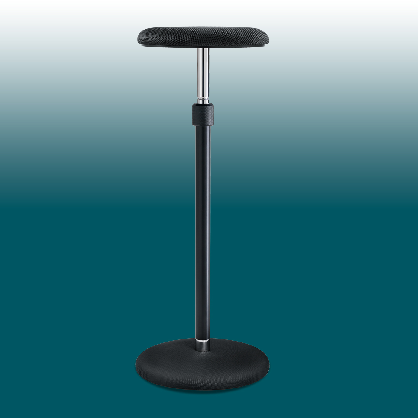A modern, height-adjustable Girsberger standing seat with a black, padded seat on a slender, chrome-and-black frame. The column ends in a sturdy, round, black base plate. Provides support whilst standing.